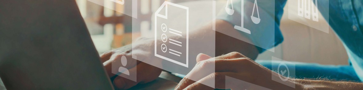 Person on laptop with compliance icons